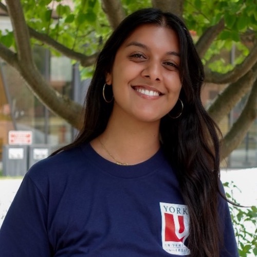 Smiling student wearing dark blue t-shirt with YorkU logo